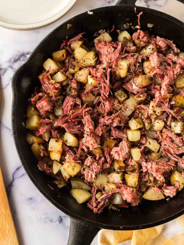 corned beef hash in a cast iron skillet