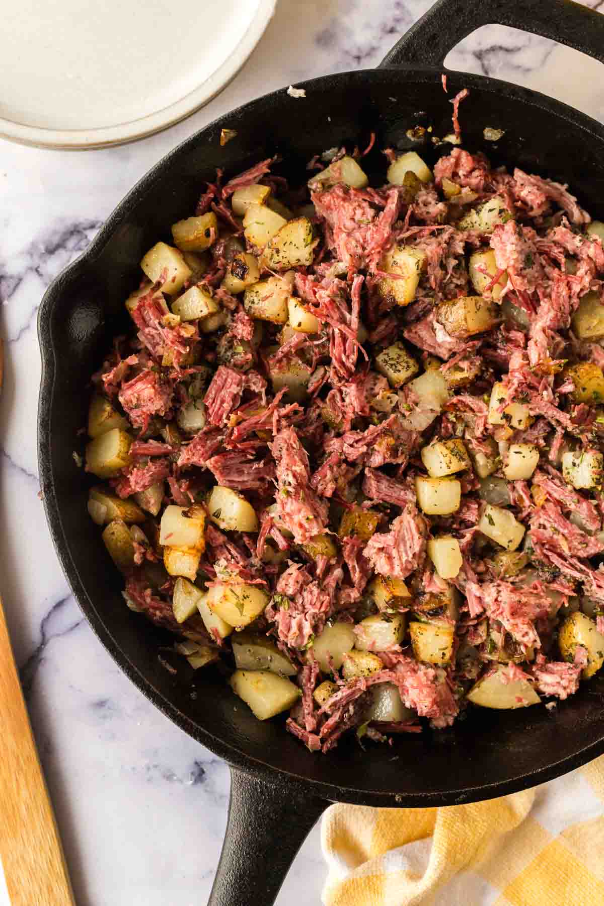 corned beef hash in a cast iron skillet
