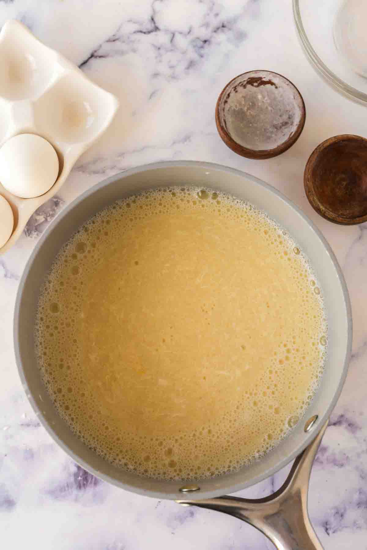 a pot with ingredients of egg drop soup