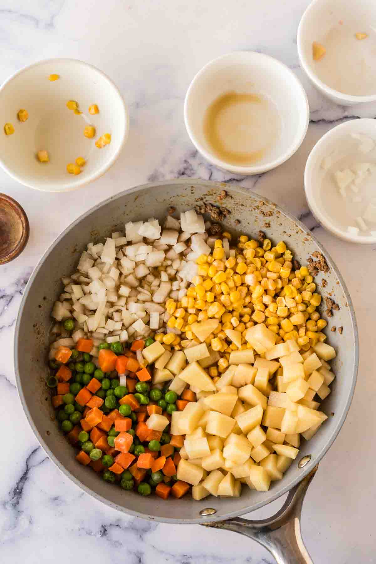 sauce pan filled with empanada ingredients