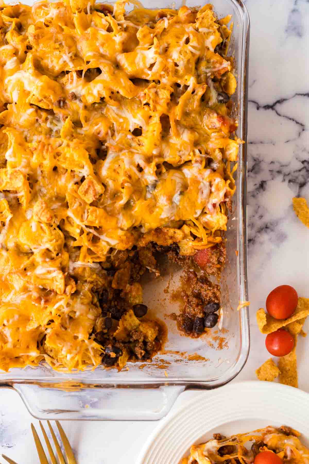 casserole dish with frito pie in it