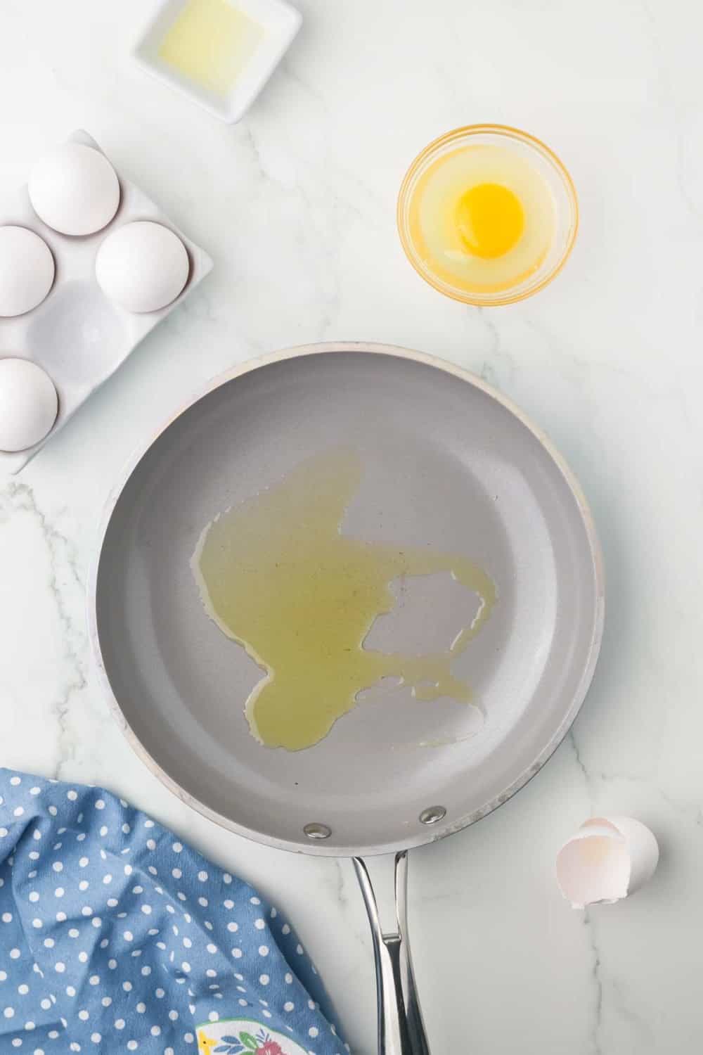 pan with oil ready to fry an egg