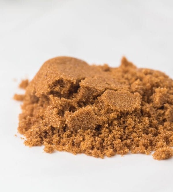 small pile of softened brown sugar on a white countertop