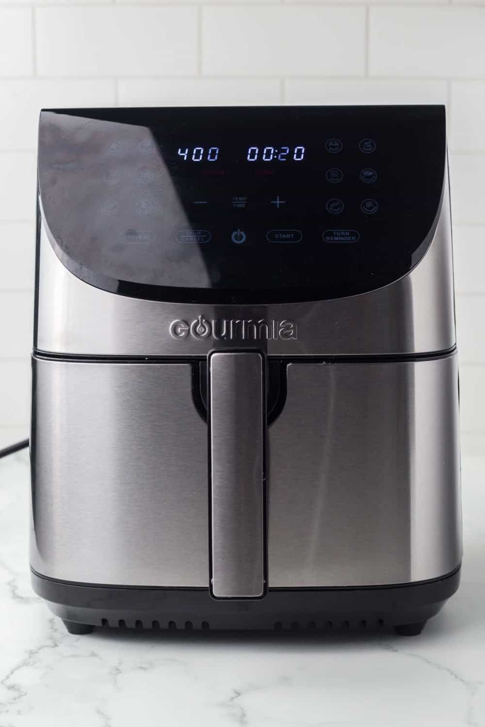 image of a clean stainless steel air fryer at 400 degrees