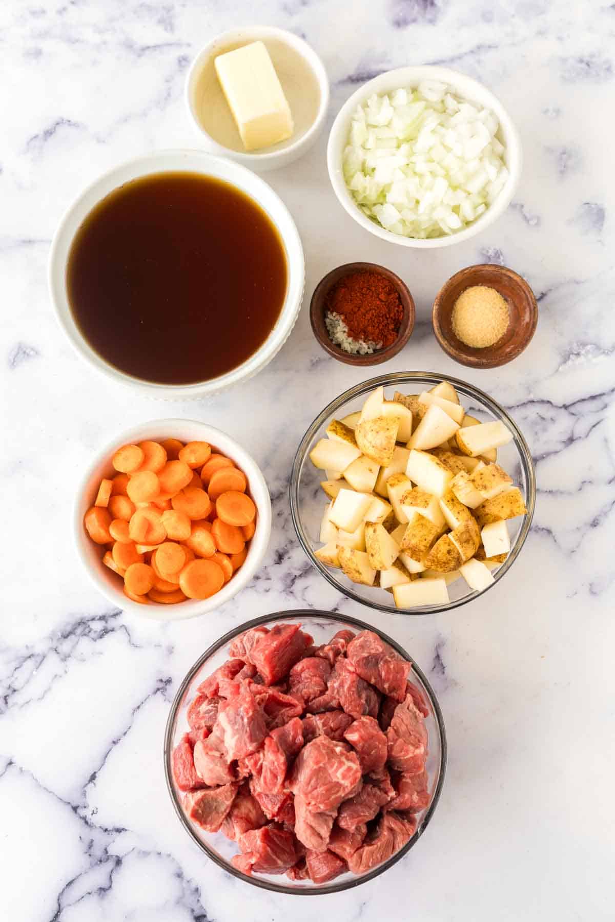 small portion dishes of raw ingredients for Hungarian goulash recipe