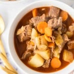 top view of a serving of Hungarian goulash in white bowls