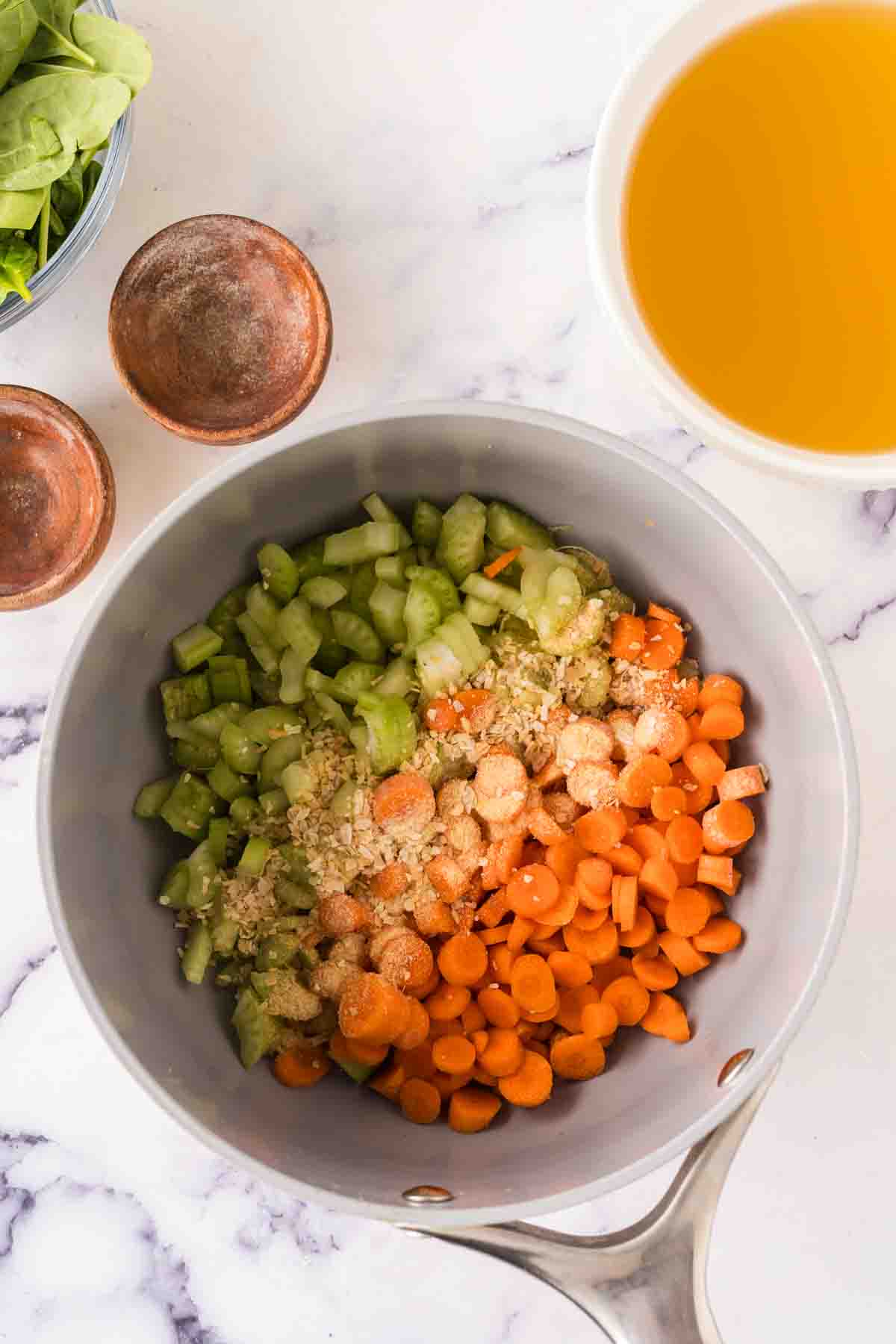 pot with raw ingredients of Italian wedding soup