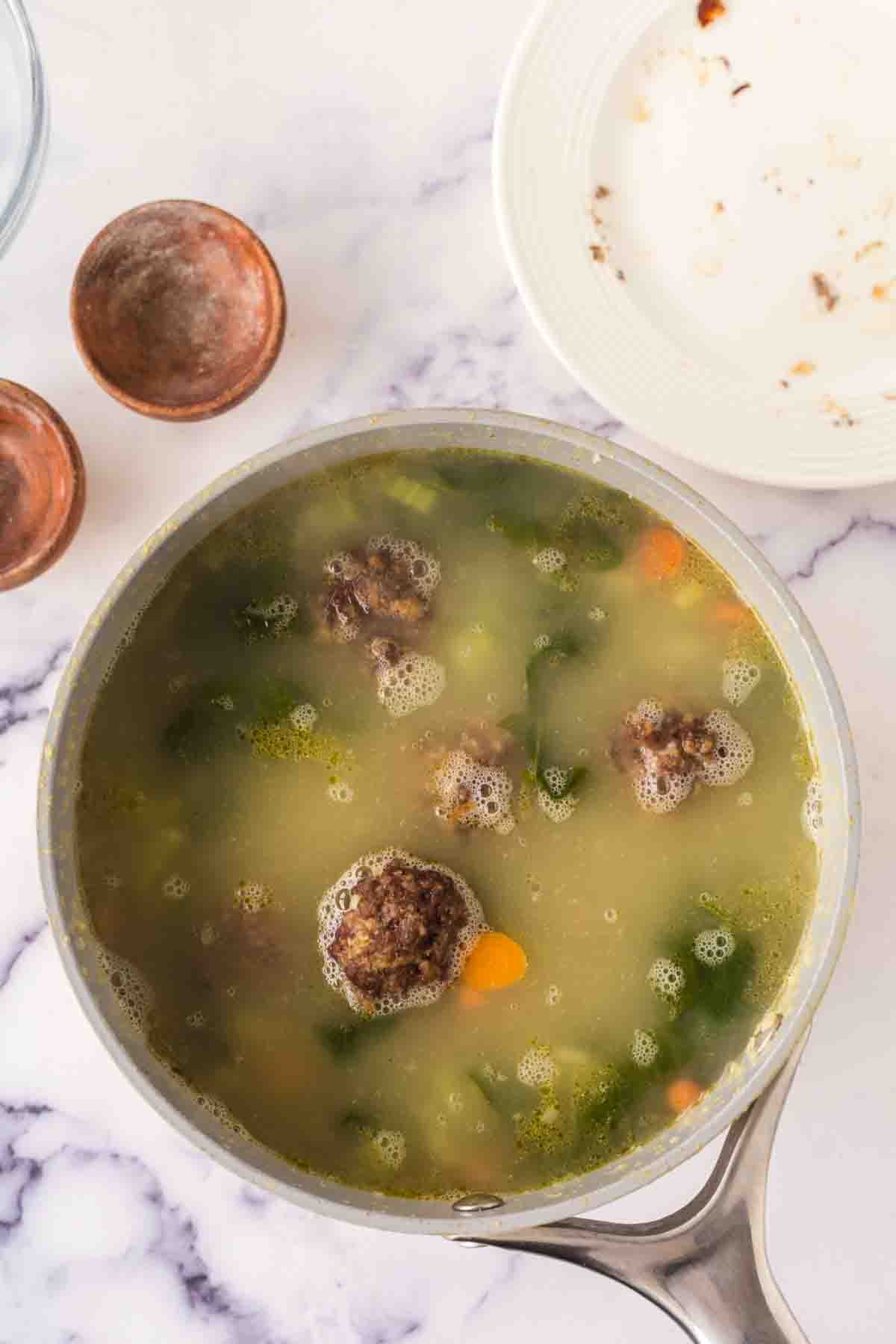 top view of a sauce pan with Italian wedding soup