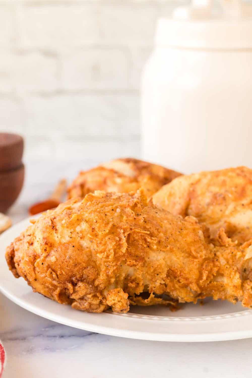 close up of the crispy exterior Louisiana fried chicken legs