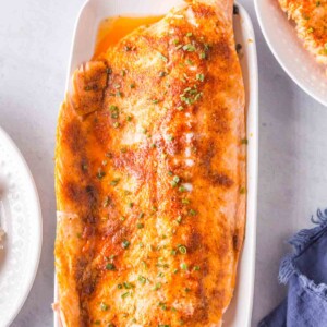 long white plate with the baked salmon recipe