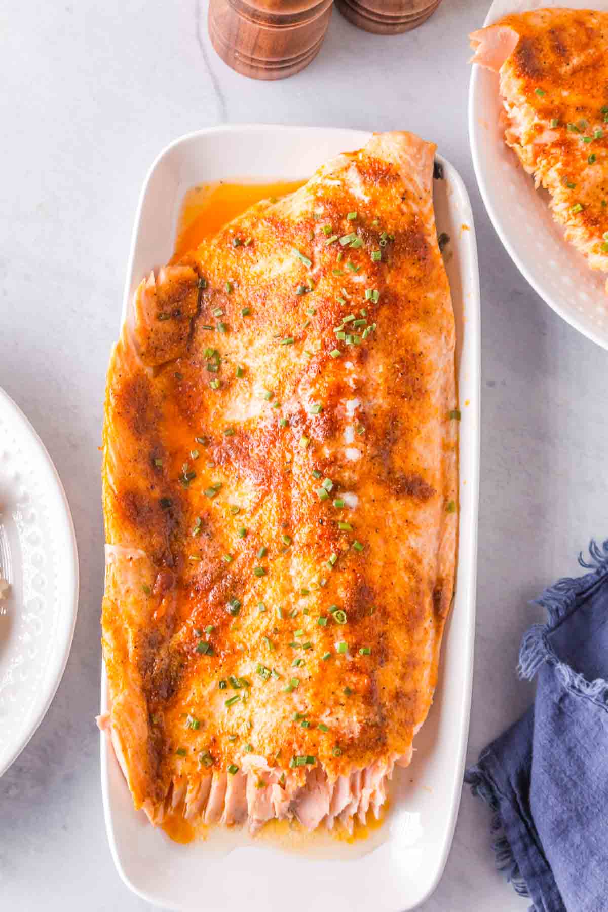 long white plate with the baked salmon recipe