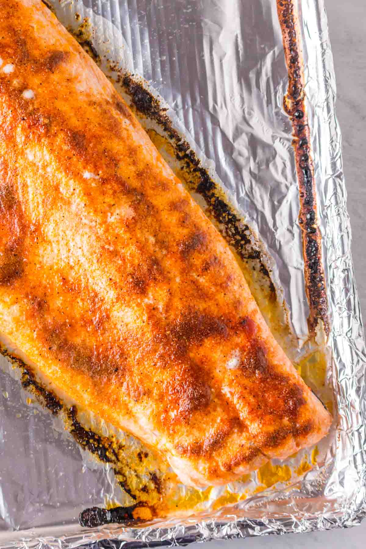 spiced and baked salmon filet over tin foil