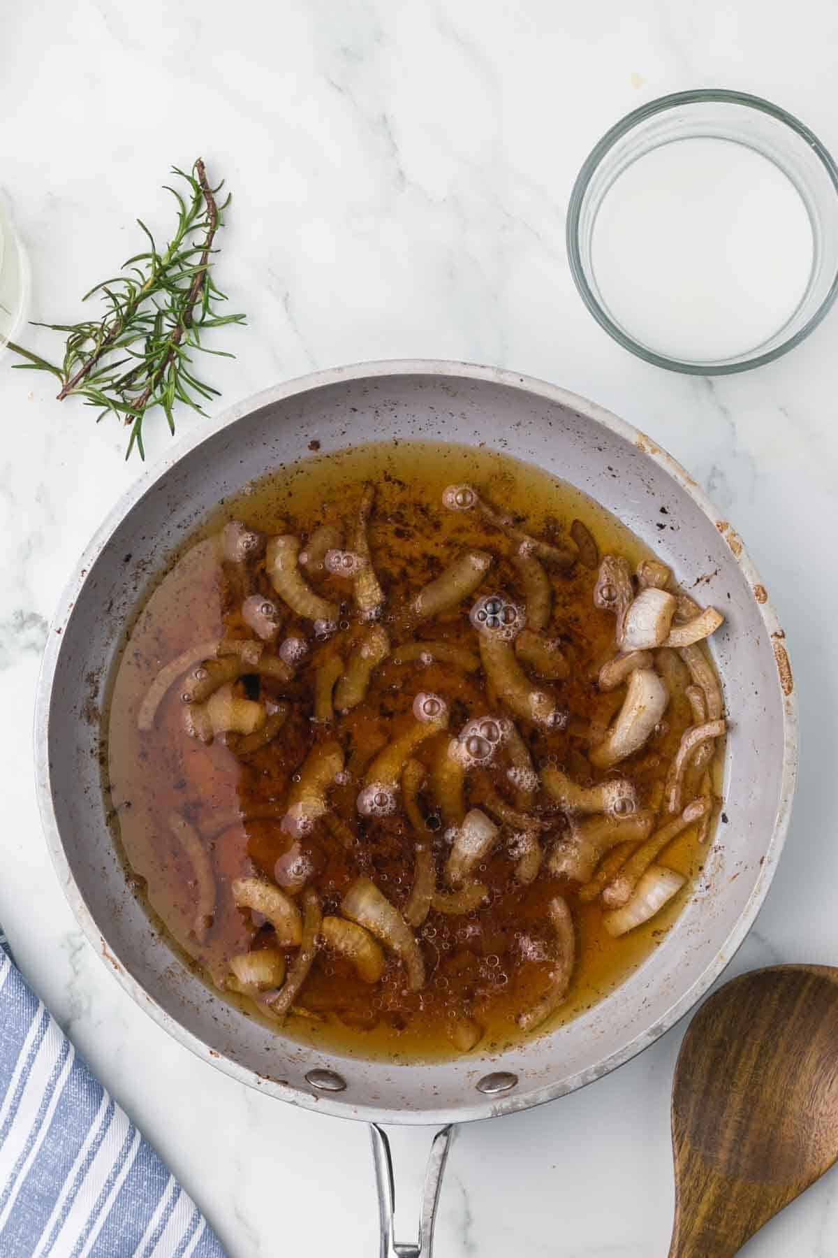 sautéed caramelized onions in a sautéed pan