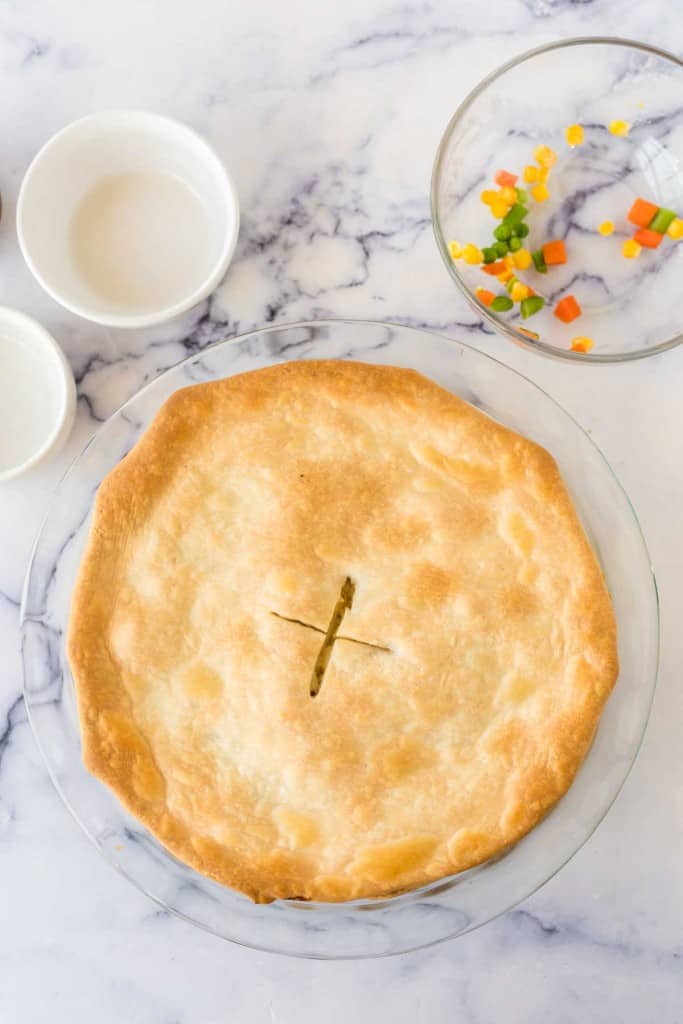Finished turkey pot pie with an X in the center.