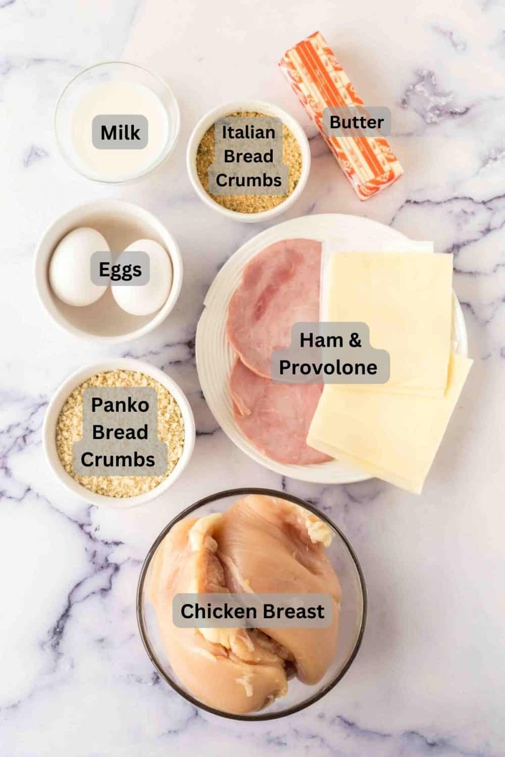 portion dishes with labels for raw ingredients for chicken cordon bleu rolls