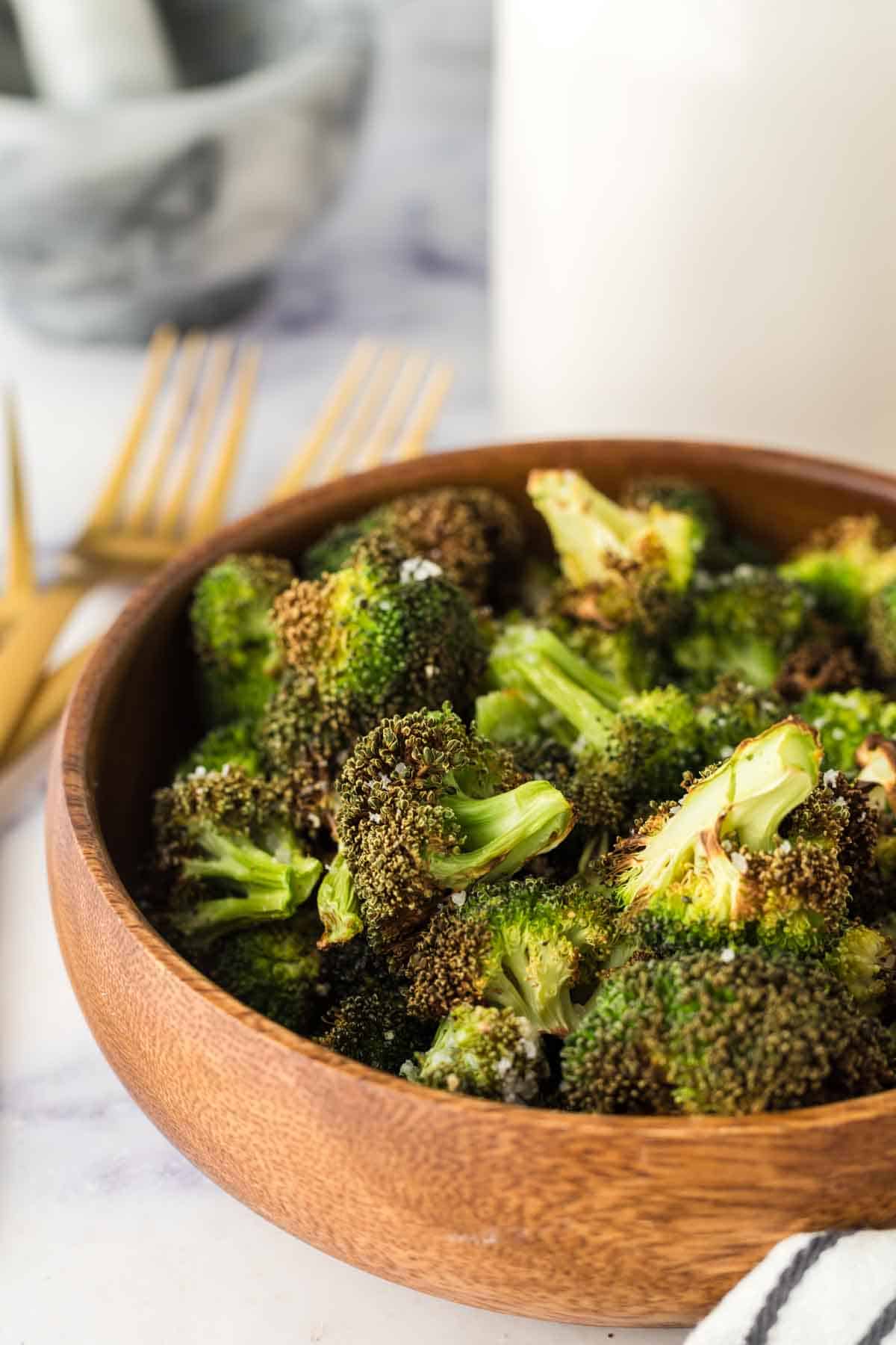 wooden bowl of air fryer broccoli