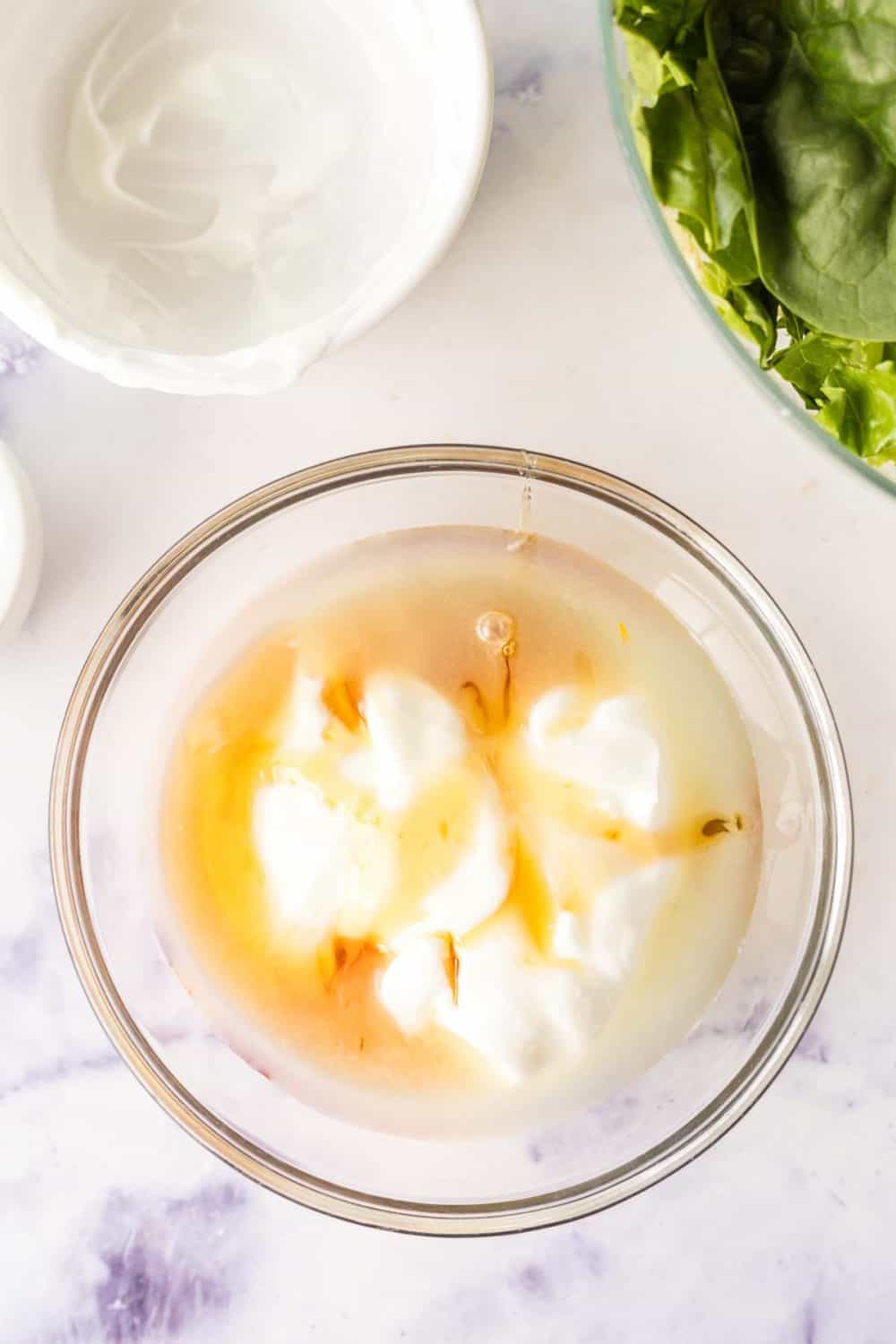 clear bowls with apple salad ingredients