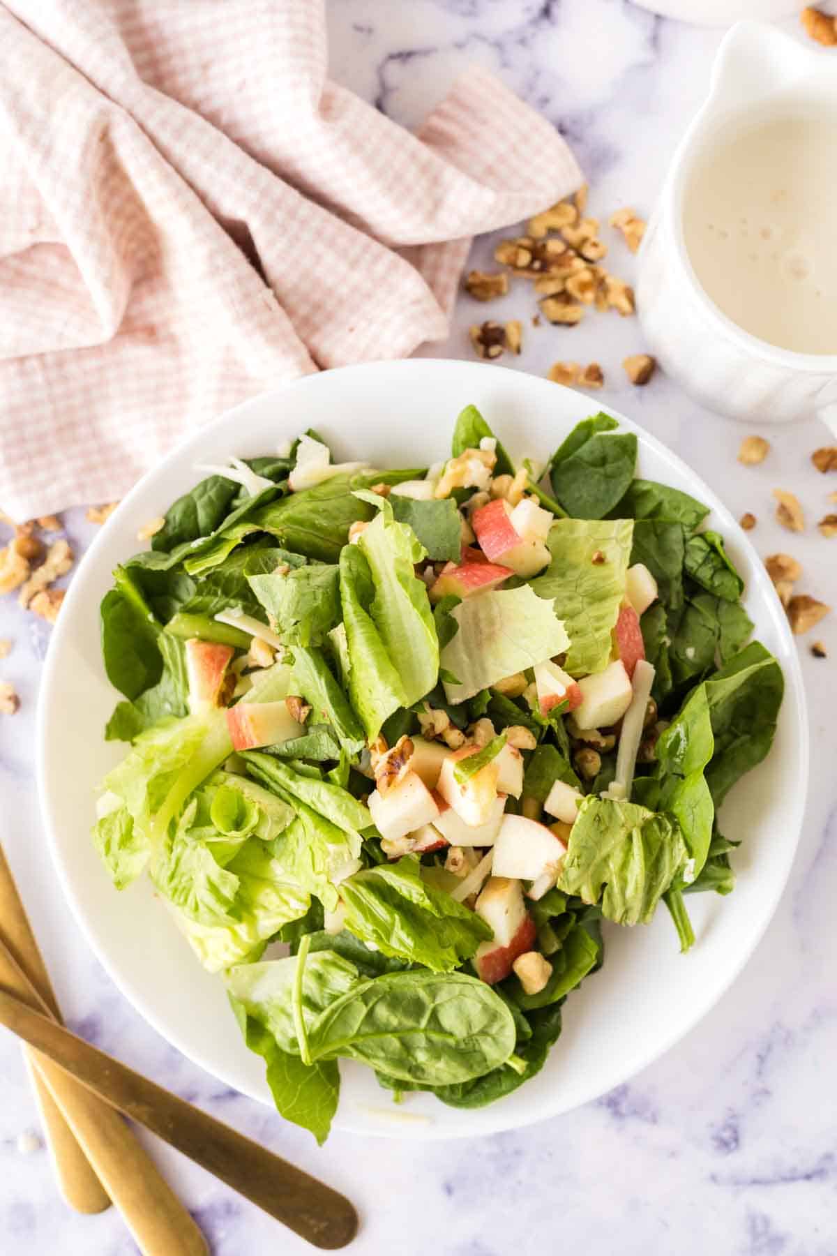 white dish with apple salad served