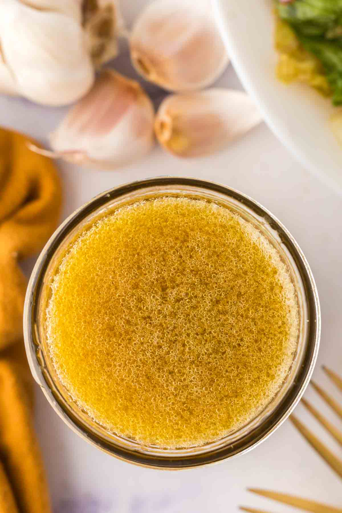 top view into a mason jar with asian salad dressing