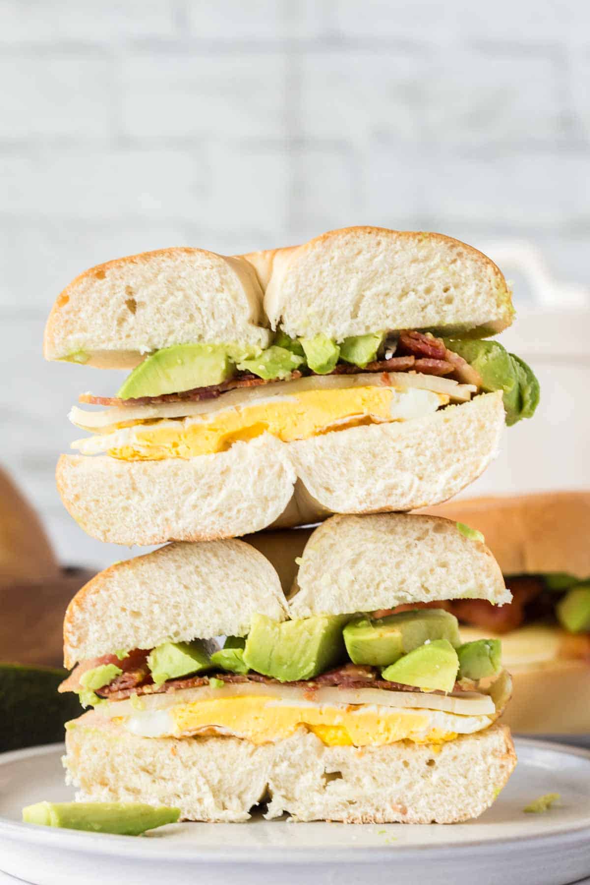 side view of a half bagel sandwich stacked on another