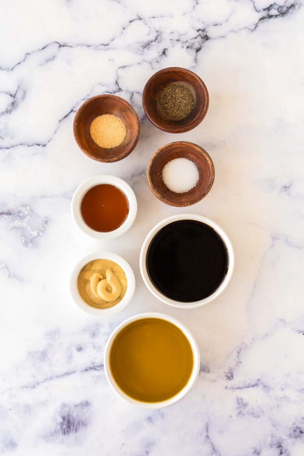 small dishes of portioned ingredients for balsamic vinaigrette