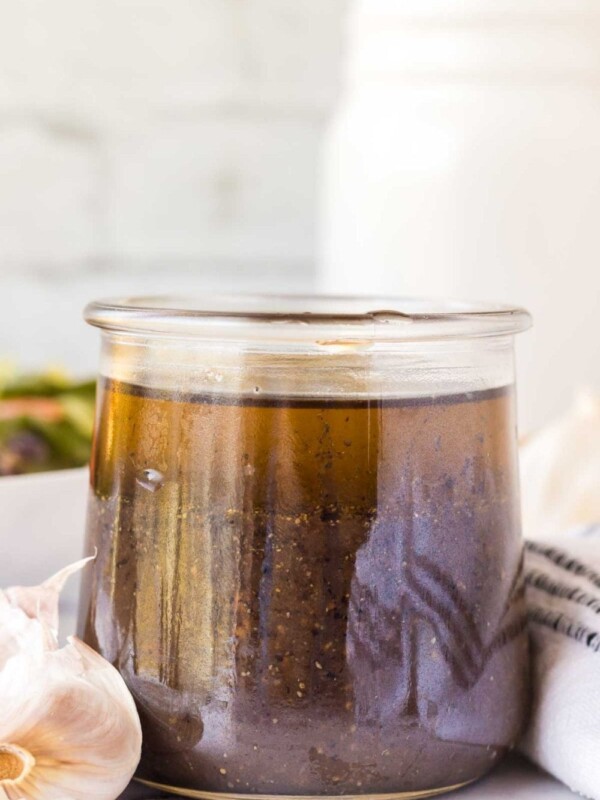 small glass jar with balsamic vinaigrette