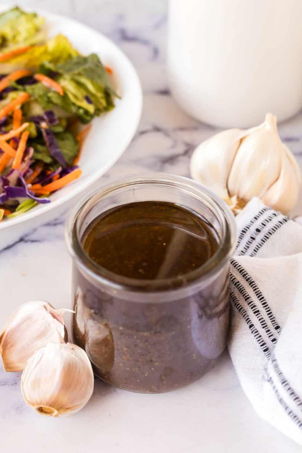 small glass jar with balsamic vinaigrette