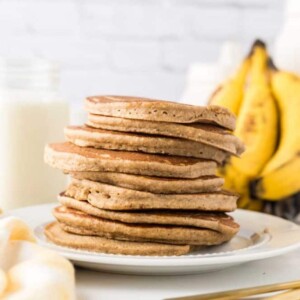 side view of a stack of banana oatmeal pancakes