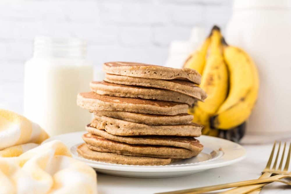 side view of a stack of banana oatmeal pancakes