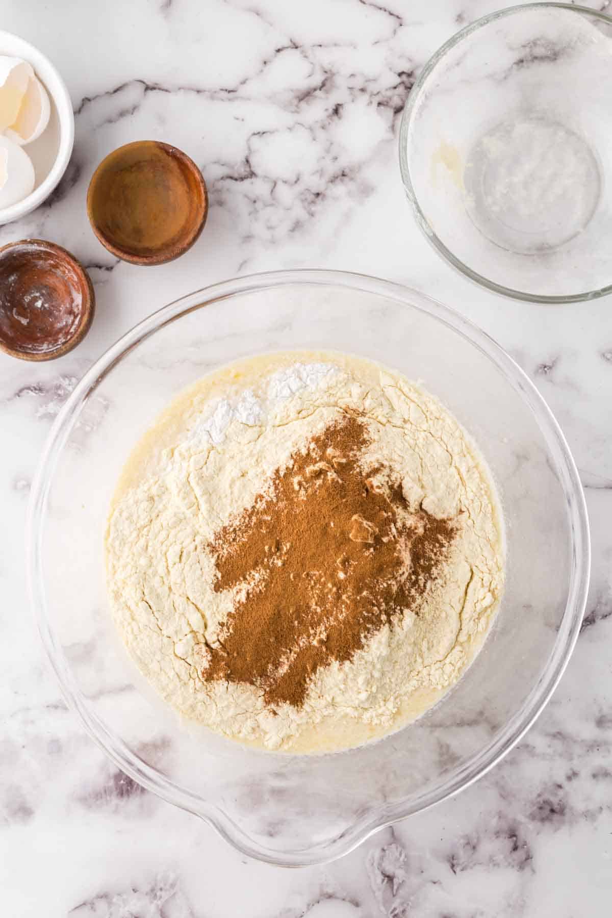 clear mixing bowl with banana pancake ingredients