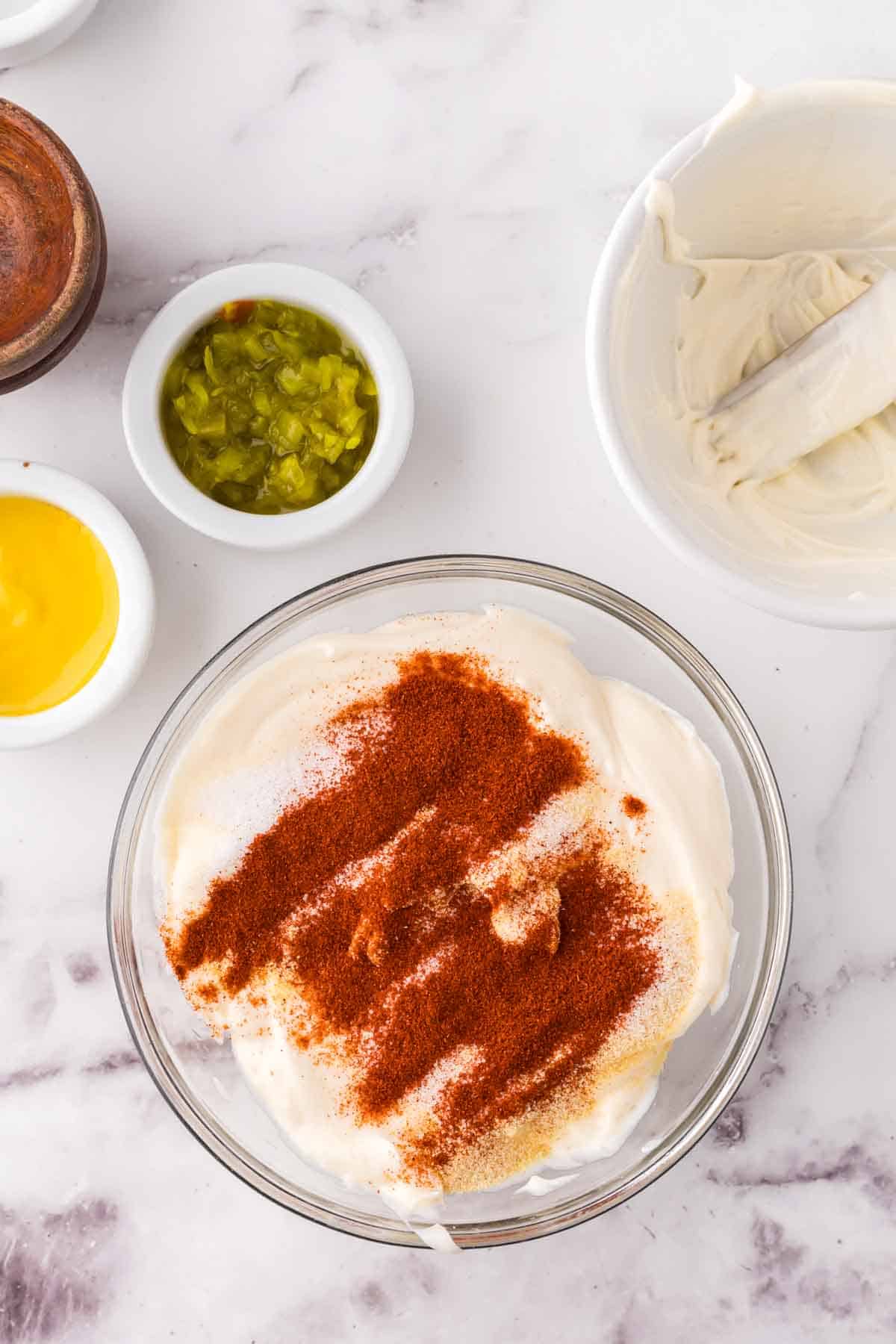 clear mixing bowl with big mac sauce ingredients