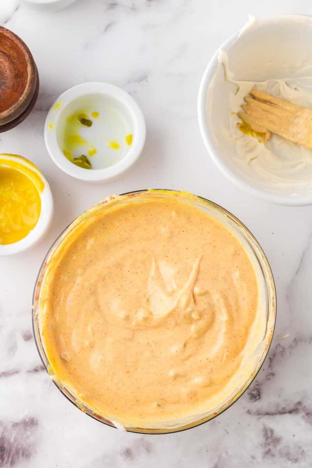 clear mixing bowl with big mac sauce ingredients