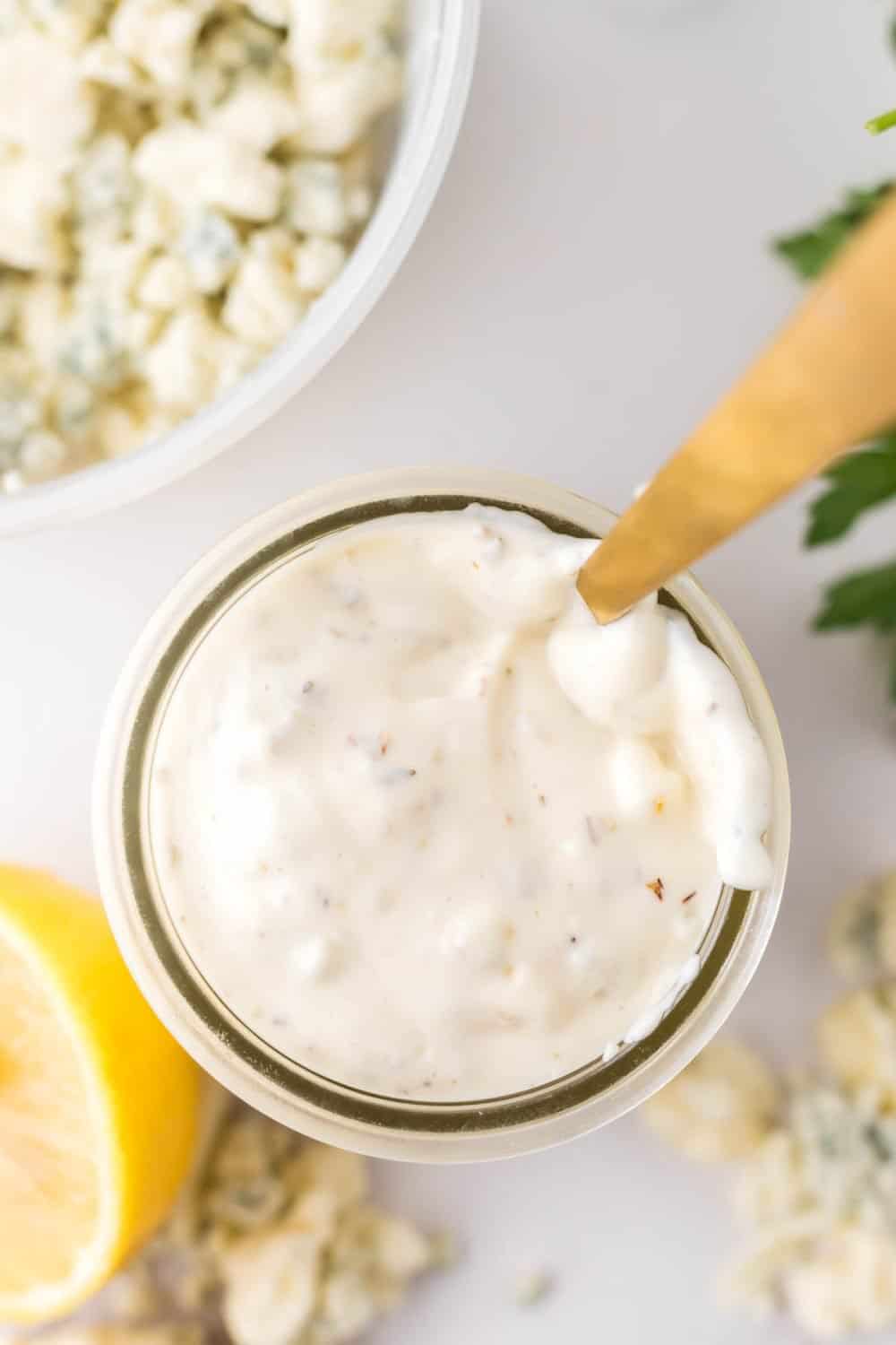 top view of a small jar of homemade blue cheese dressing