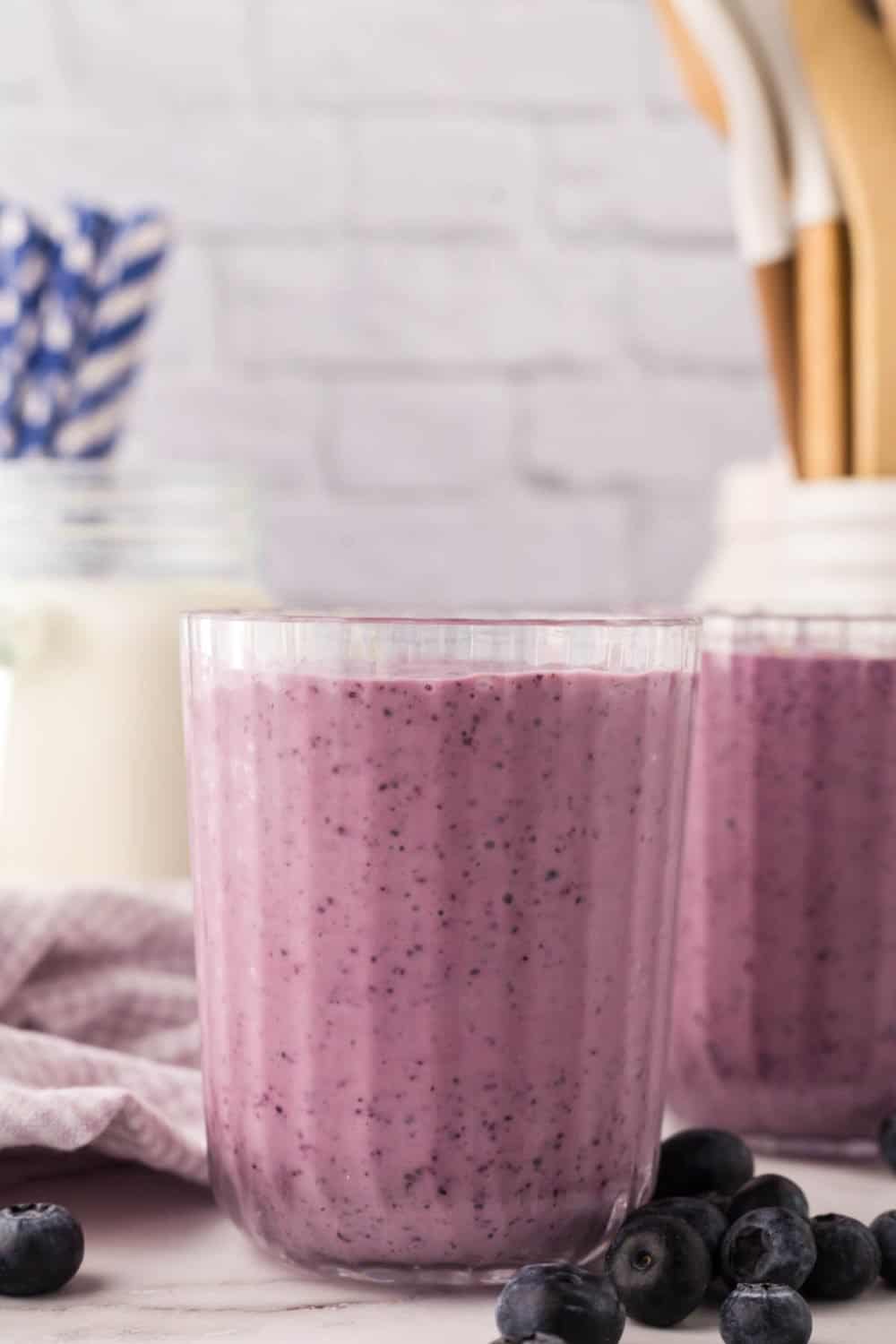 blueberry smoothies in nice ribbed glasses