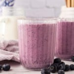 blueberry smoothies in nice ribbed glasses