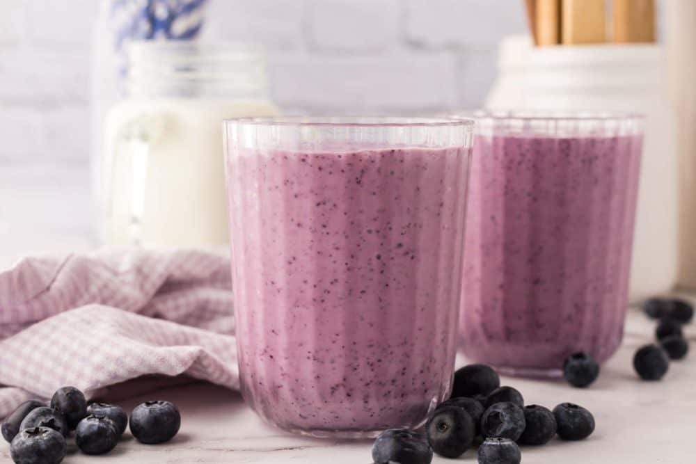 blueberry smoothies in nice ribbed glasses