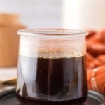 Brown sugar syrup in a small glass jar.