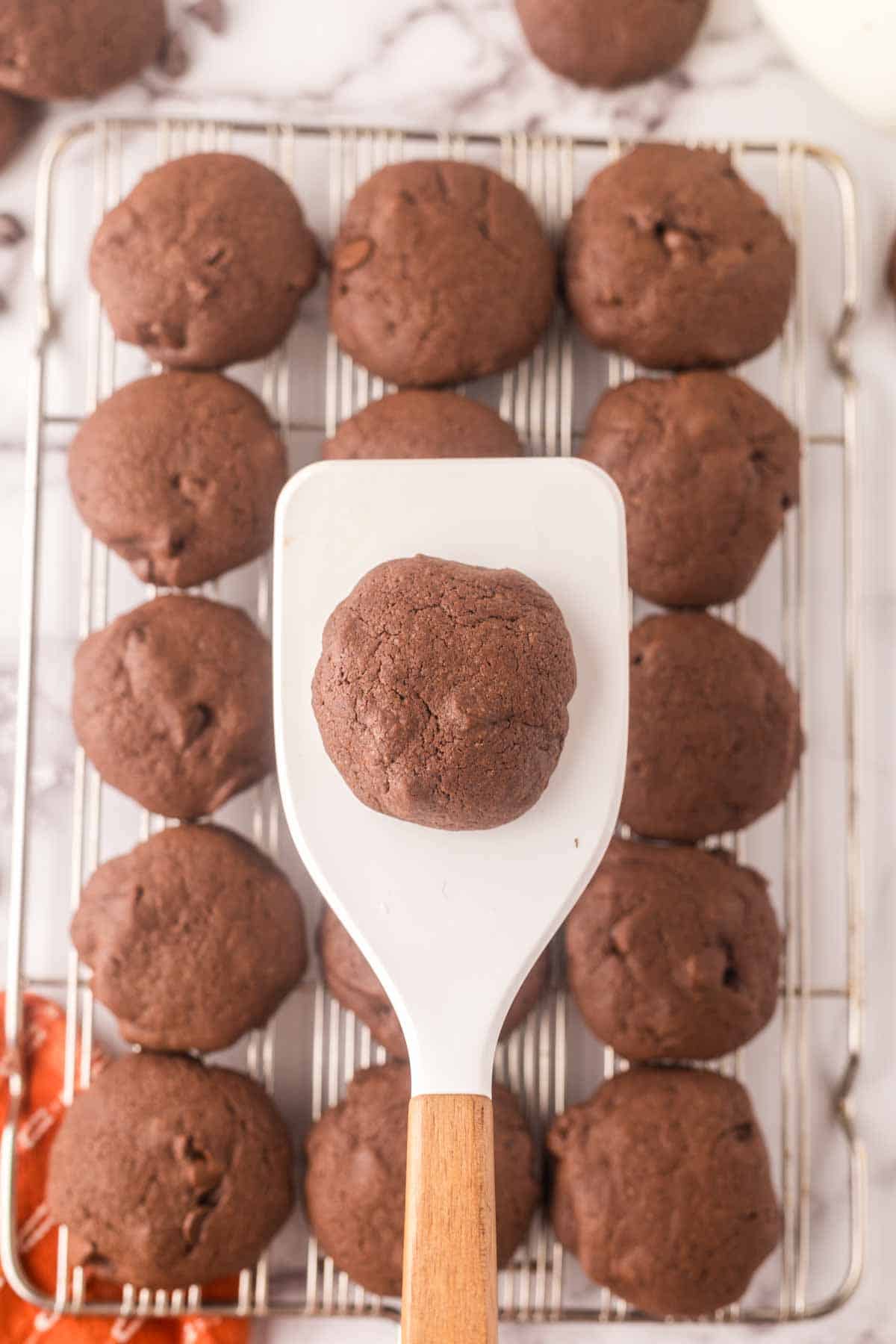 POV spatula with baked brownie cookies