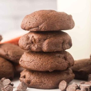 close up of four baked brownie cookies in a stack