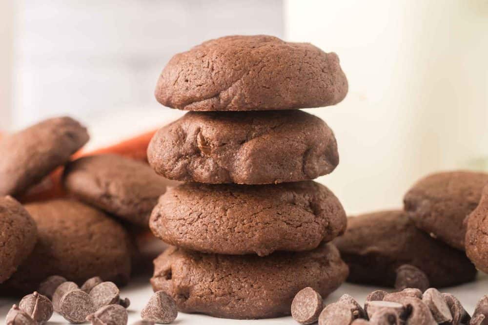 close up of four baked brownie cookies in a stack