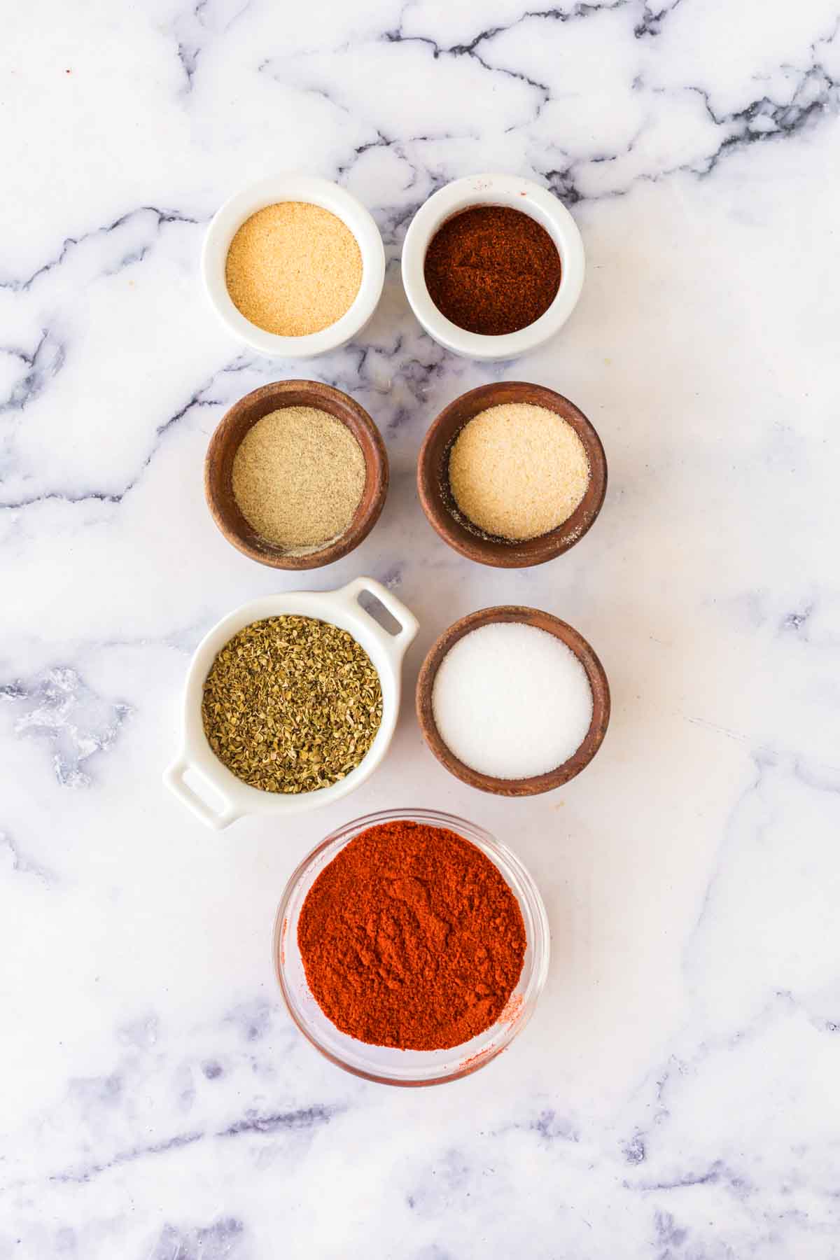 portion dishes with ingredients for cajun seasonings