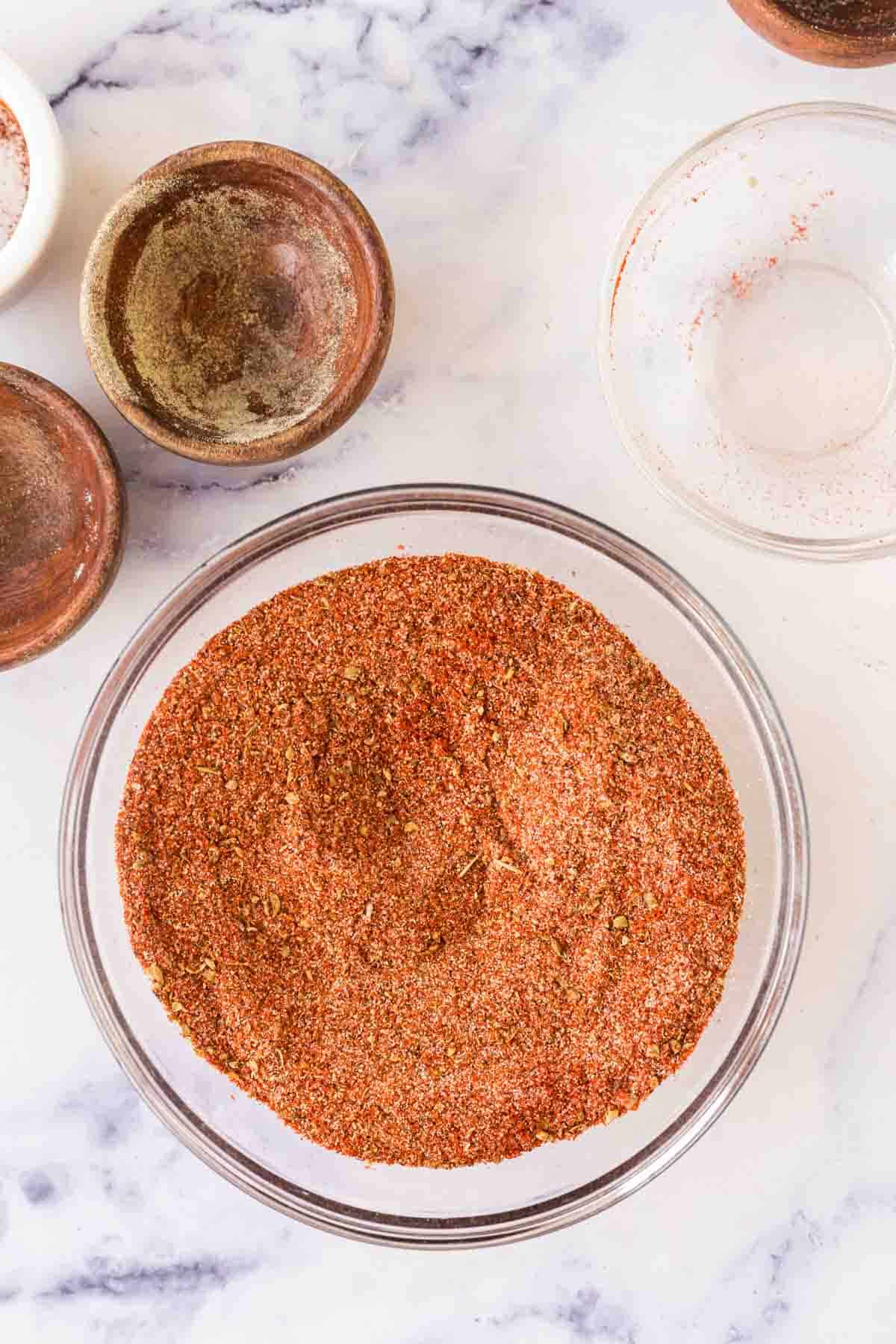 clear mixing bowl with cajun seasoning