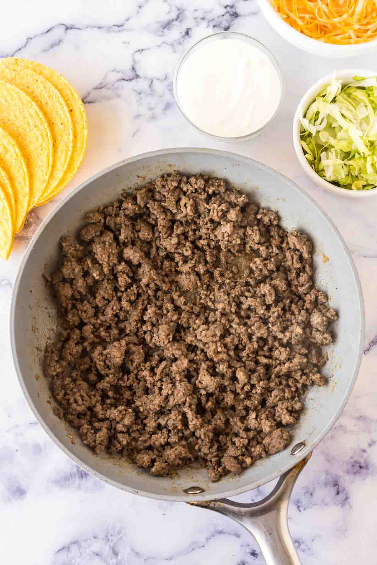 pan cooking hamburger meat for cheesy gordita crunch recipe