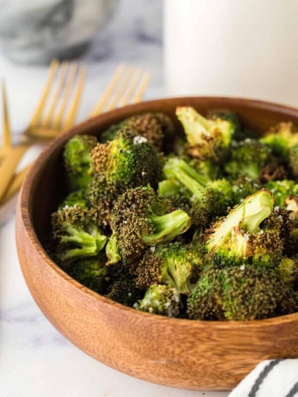 wooden bowl of air fryer broccoli.