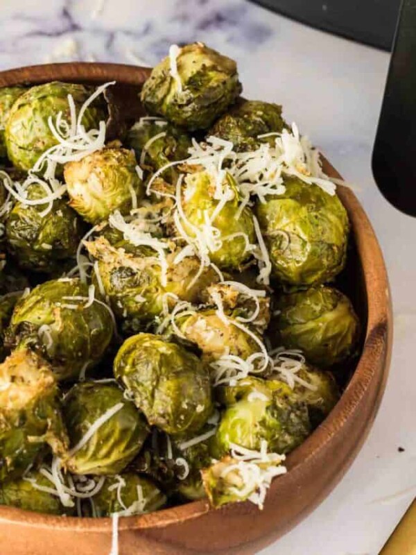 small wooden bowl with air fryer brussel sprouts