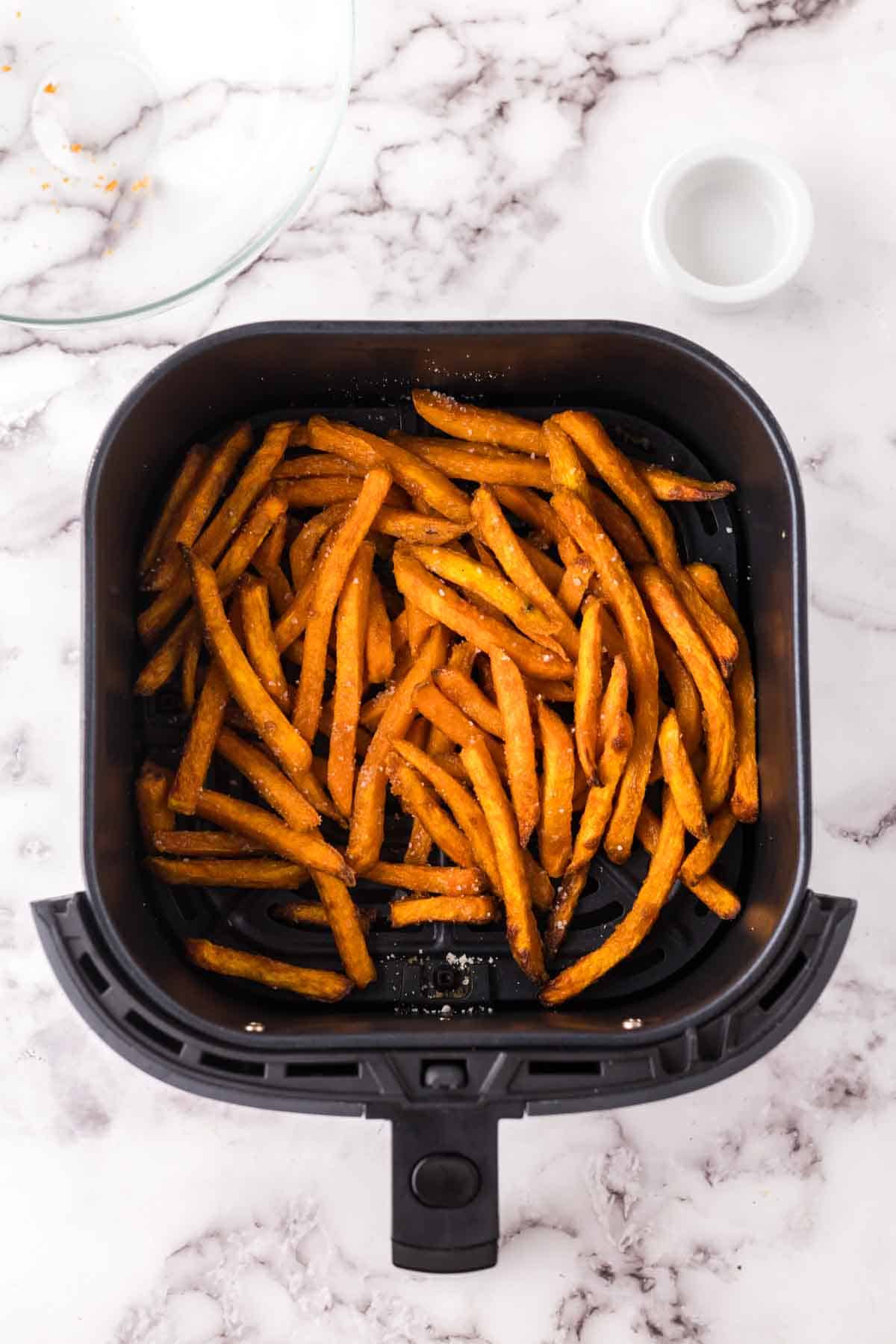 basket of air fryer sweet potato fries.