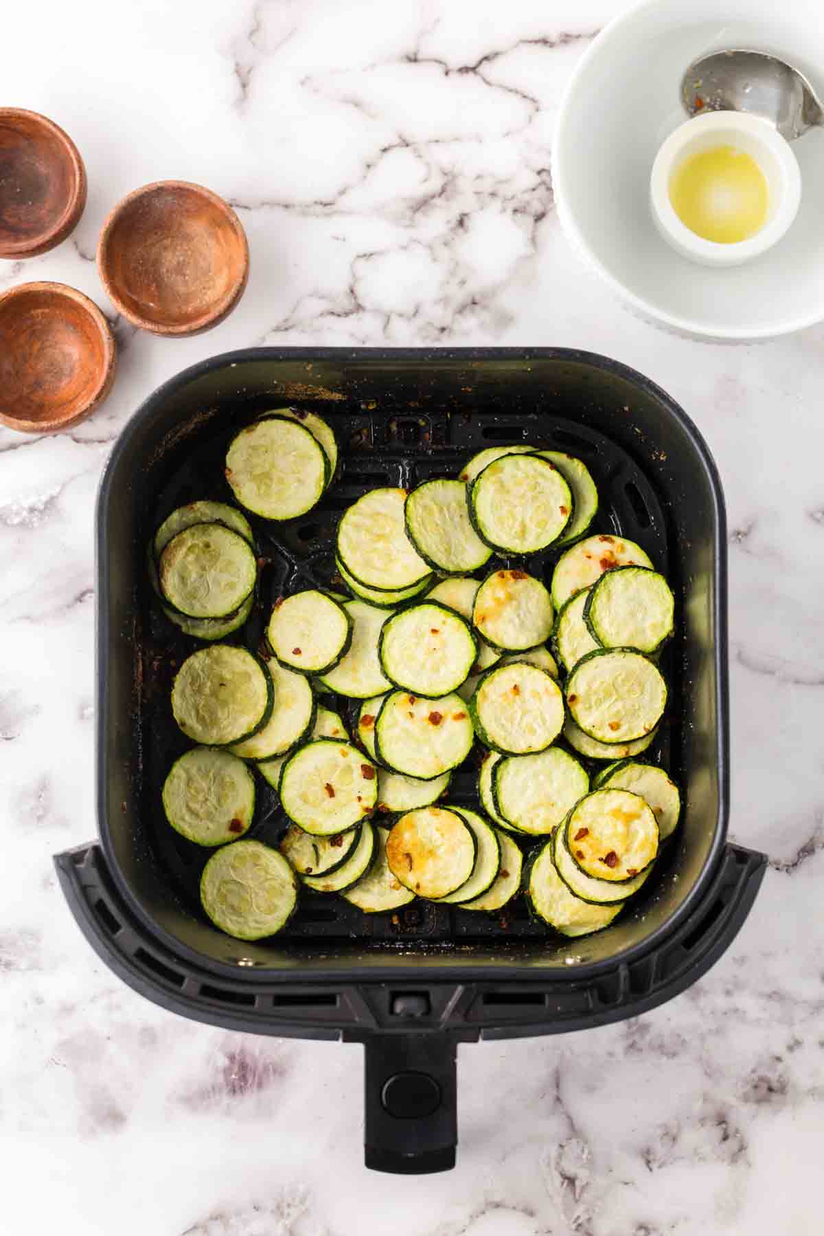 basket with air fryer zucchini recipe.