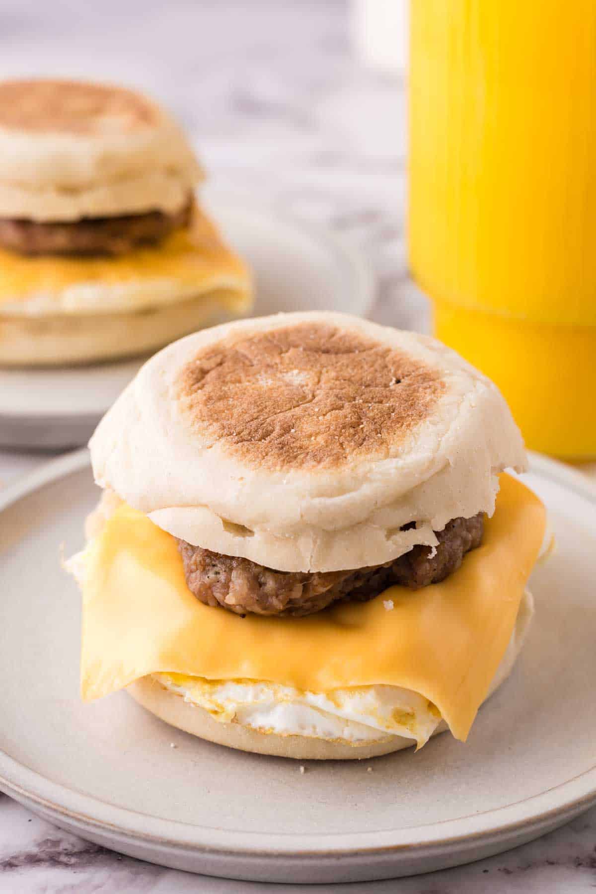 English muffin egg and sausage breakfast sandwich.