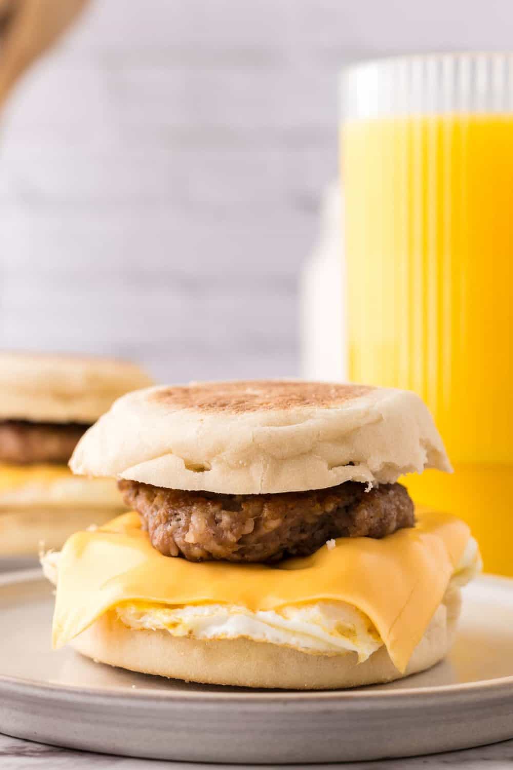 English muffin egg and sausage breakfast sandwich.