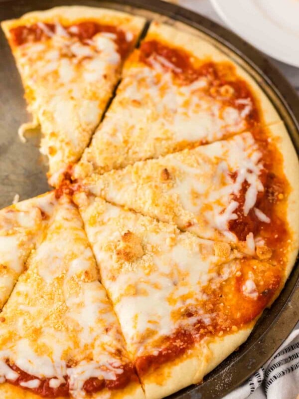 baked cheese pizza recipe on a tray.